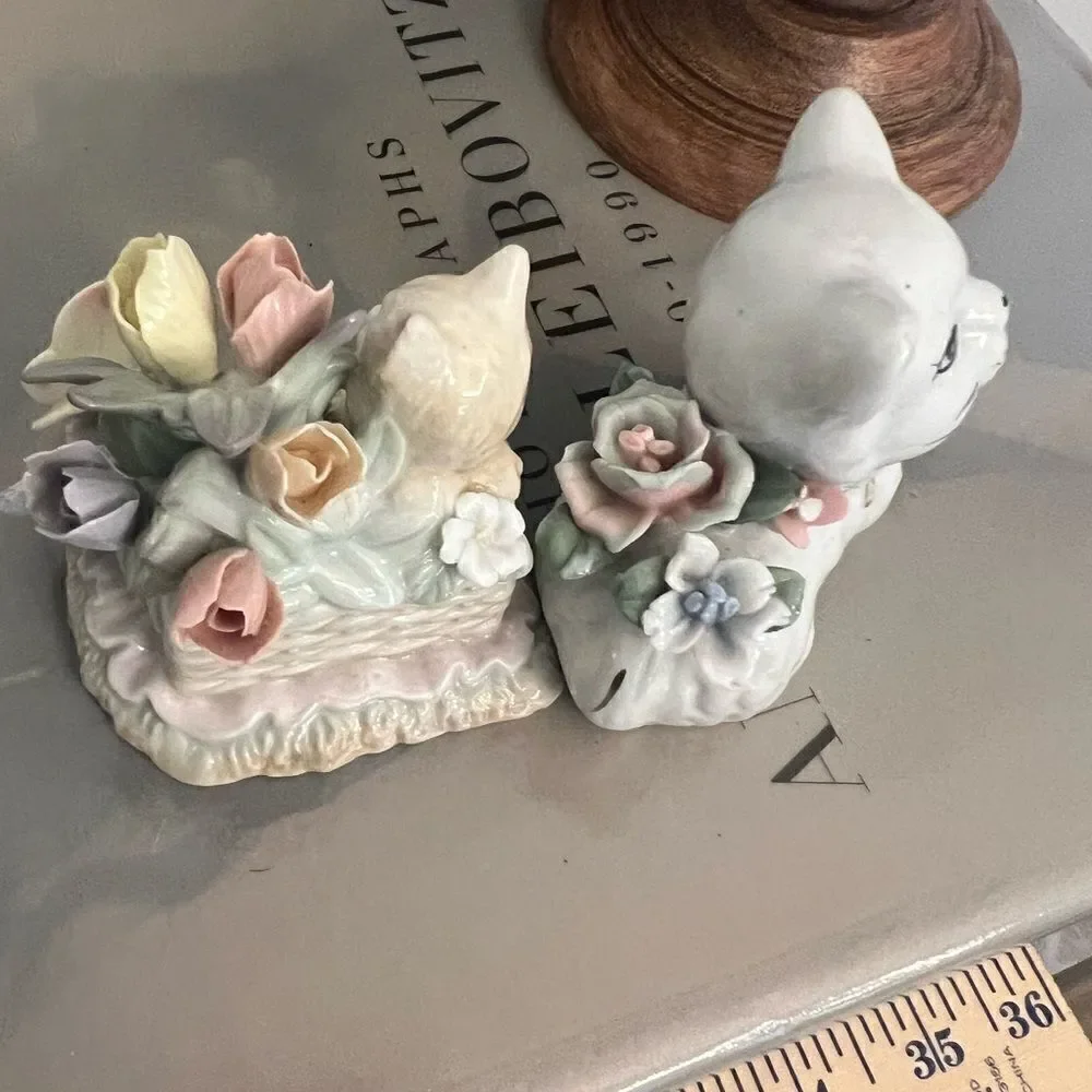 Set of two vintage small ceramic white and floral cats.